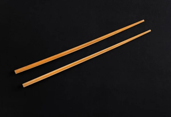 Ξύλινων Chopsticks Απομονώνονται Μαύρο Backgroun — Φωτογραφία Αρχείου