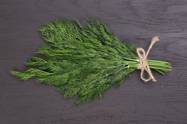 A bunch of dill tied with a rope