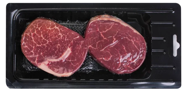 Deux steaks dans un emballage sous vide — Photo