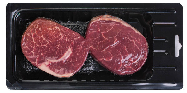 Two steaks in vacuum packaging