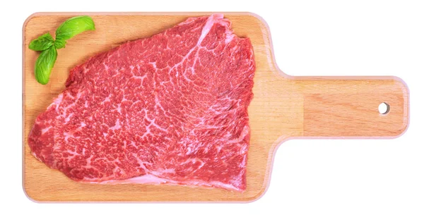 Steak de boeuf marbré cru frais sur une planche de bois — Photo