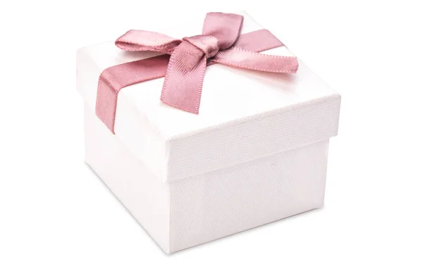 White box for jewelry with a pink bow — 图库照片