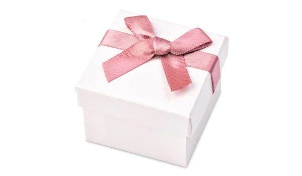 White box for jewelry with a pink bow — 图库照片