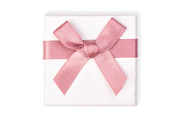 White box for jewelry with a pink bow — Stockfoto