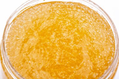 Şeffaf turuncu masaj jeli, makro çekim.