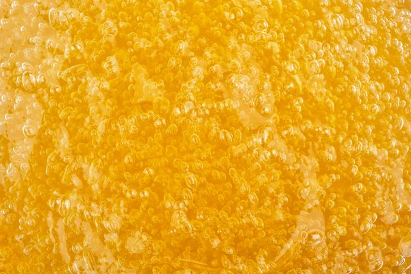 Lata Transparente Gel Massagem Laranja Macro Tiro — Fotografia de Stock