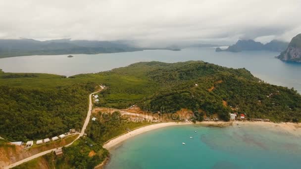 The beautiful bay with mountains rocks aerial view. Tropical islands. — Stock Video