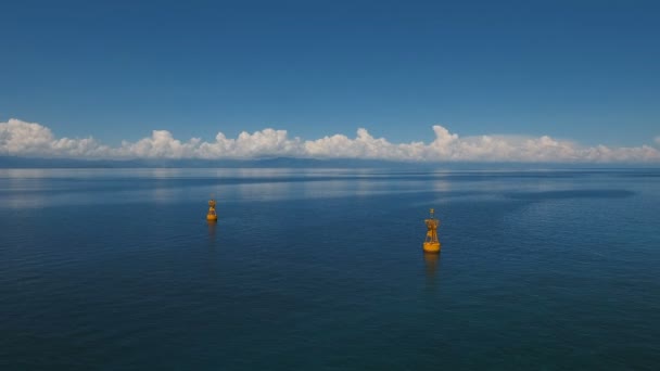Orange buoy in the sea. — Stock Video