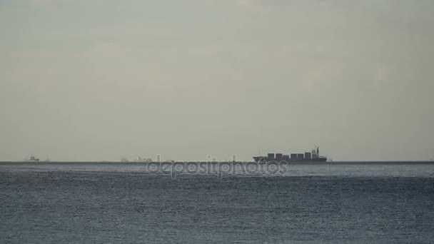 Cargo ship sails on the sea. Philippines, Manila. — Stock Video