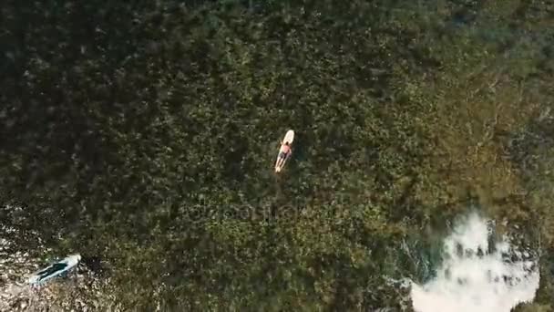 Aerial view surfers on the waves.Siargao, Philippines. Cloud 9. — Stock Video