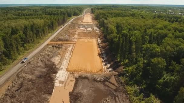 Construcción de una nueva carretera. — Vídeos de Stock