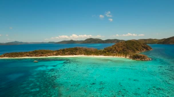 Aerial view beautiful beach on a tropical island Malcapuya. Philippines. — Stock Video