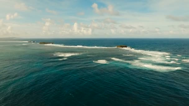 Rock, cliff in the blue sea. Philippines,Siargao.Aerial view. — Stock Video