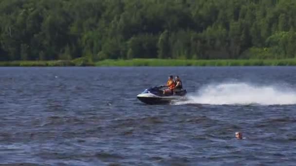 Riders on jet ski on lake. — Stock Video