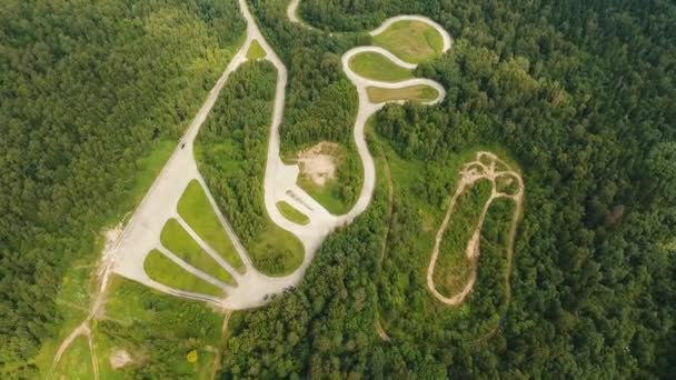 Test road in the forest. Aerial view — Stock Video