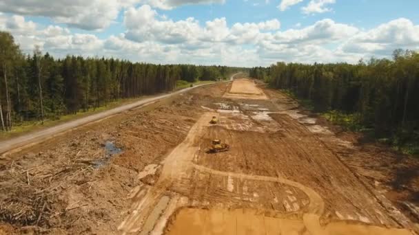 Construcción de una nueva carretera. — Vídeo de stock