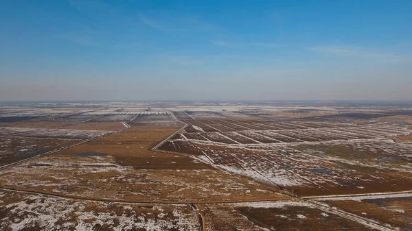 Winter snow field. Winter landscape.