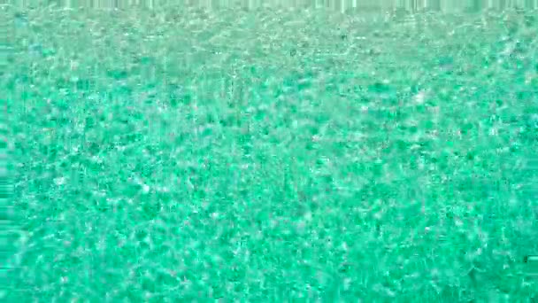 Acqua di mare turchese per sfondo. La superficie dell'acqua di mare in una laguna tropicale. — Video Stock