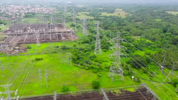 View of electric transformer station, power transmission line. — Stock Video