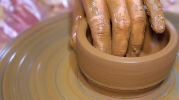 The Potters wheel and hands of the Potter. — Stock Video