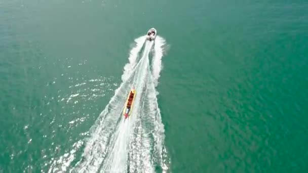 People ride the inflatable watercraft boat. Philippines. — Stock Video