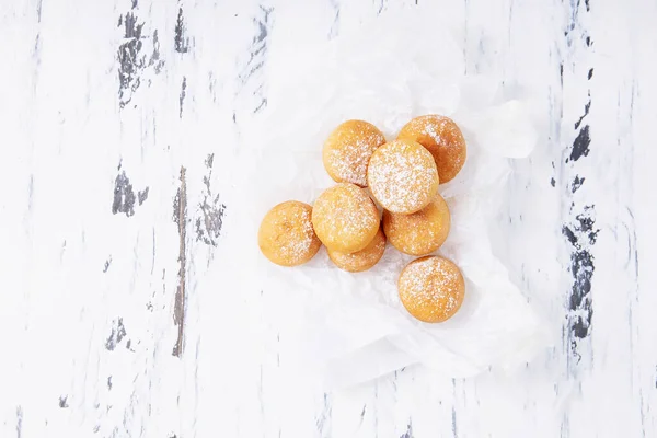 Fresh Fried Mini Donuts Sprinkled Powdered Sugar Baking Paper Rustic — Stock Photo, Image