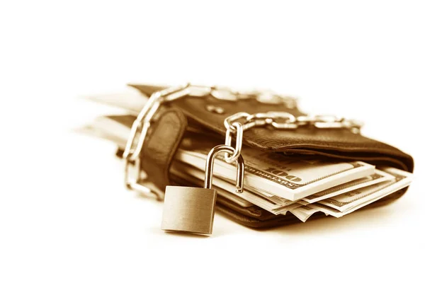 Business safety or financial protection or allow access. Heap of money in chain with open padlock isolated on white