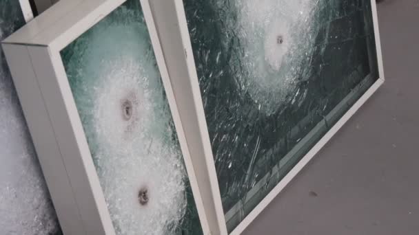 Closeup Shot of Worker`s Hands Replacing Window Frames With Bulletproof Glass With Holes From Bullets, Cracks and Fractures — Stock Video