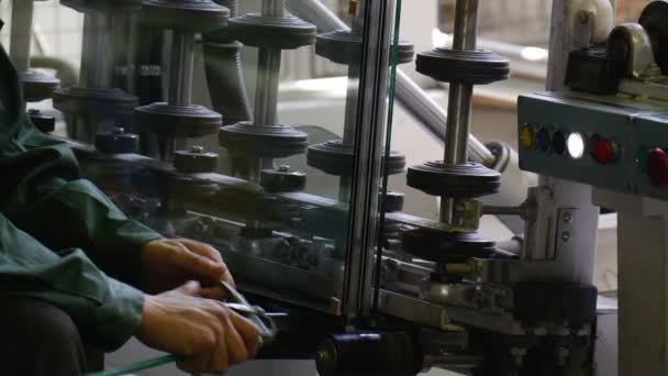 Closeup Shot of Worker`s Hands Keeping Some Specific Device With Long Hoses and Processing the Edges of Double Glazing Glass Panes, in Ukraine — Stock Video