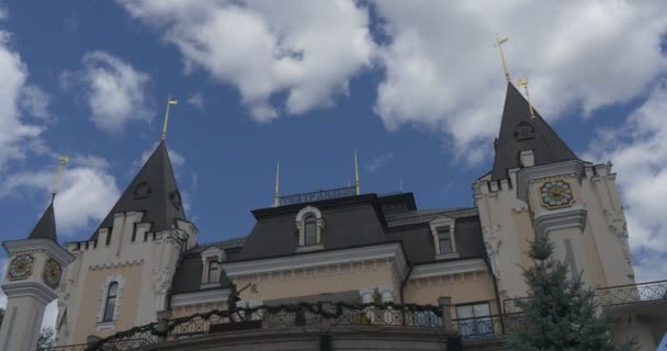 The Fairy Tale Looking Gothic Towers, Narrow Windows, and a Forged Metal Bridge, of Kiev Academic Puppet Tower in Summer — Stock Video