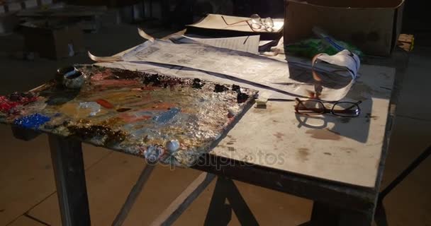 The Unexpected Table of the Renovator With Paints, Texts, Old Glasses, in the Great Church of the Assumption of the Blessed Virgin Mary — Stock Video