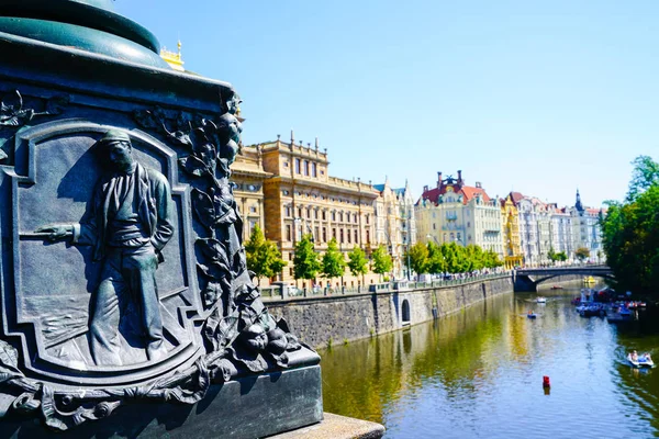 Ornate base of statue on Charles Bridge Prague Czech Republic.