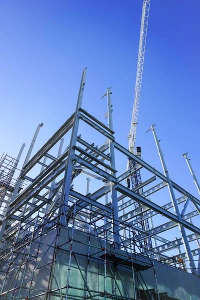 Constructiestaal kader voor nieuwbouw. — Stockfoto