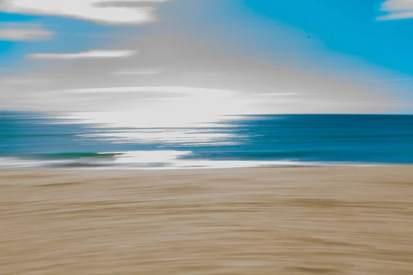 Küstenbewegungen Verschwimmen Abstrakt Mit Sonnenschimmer Über Dem Meer — Stockfoto