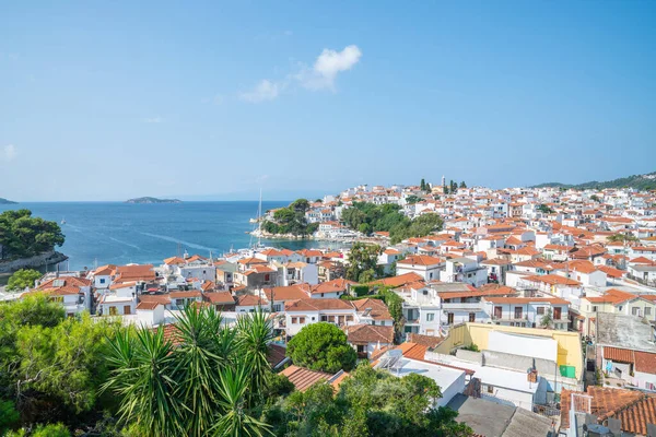 Orange roof tops and whitwashed walls of Skiathos town from top