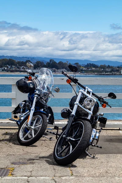 Two Bikes Parked on Pier. Two bikes parked on a California pier.