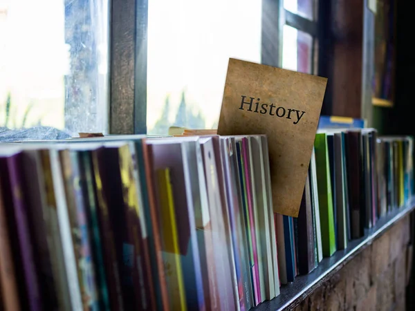History on book cover on bookshelf, education concept — Stock Photo, Image