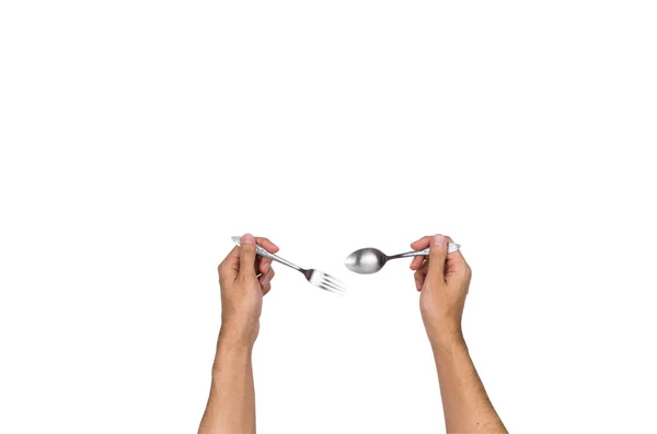 Kaşık ve çatal üstten görünüm tutan el