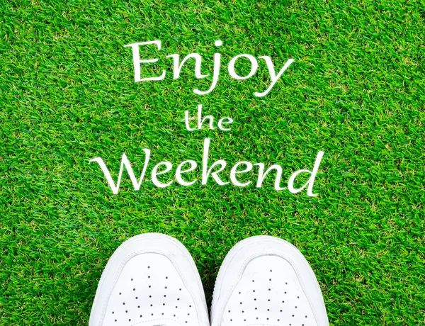 Enjoy the weekend on grass field with white sneaker, holiday and — Stock Photo, Image