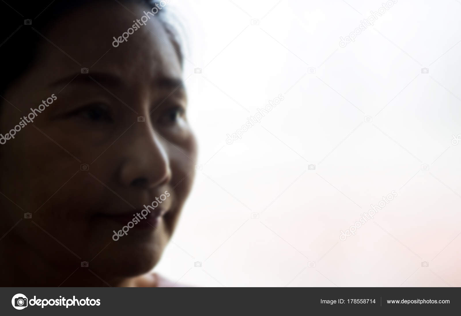 Vintage Filtered Silhouette Elderly Woman Face Close Looking Happy Smile Stock Photo C Paikong 178558714