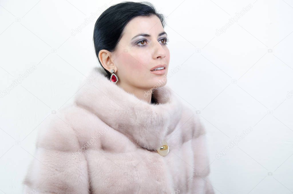 Girl in a warm fur coat