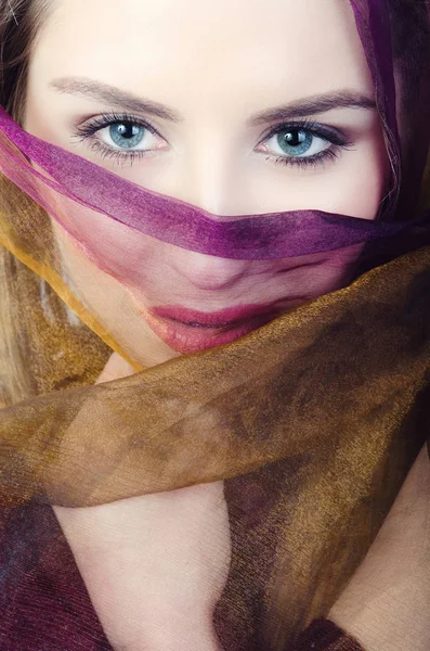 woman in hijab with sexy blue eyes
