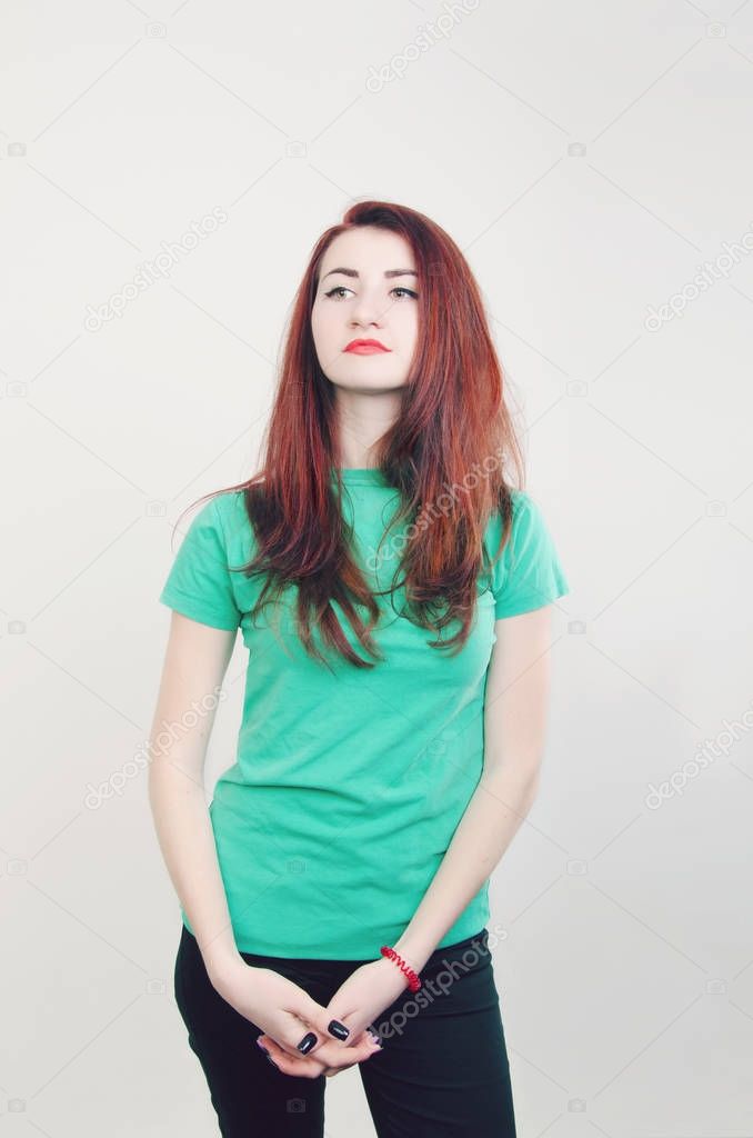 a girl is in a green shirt