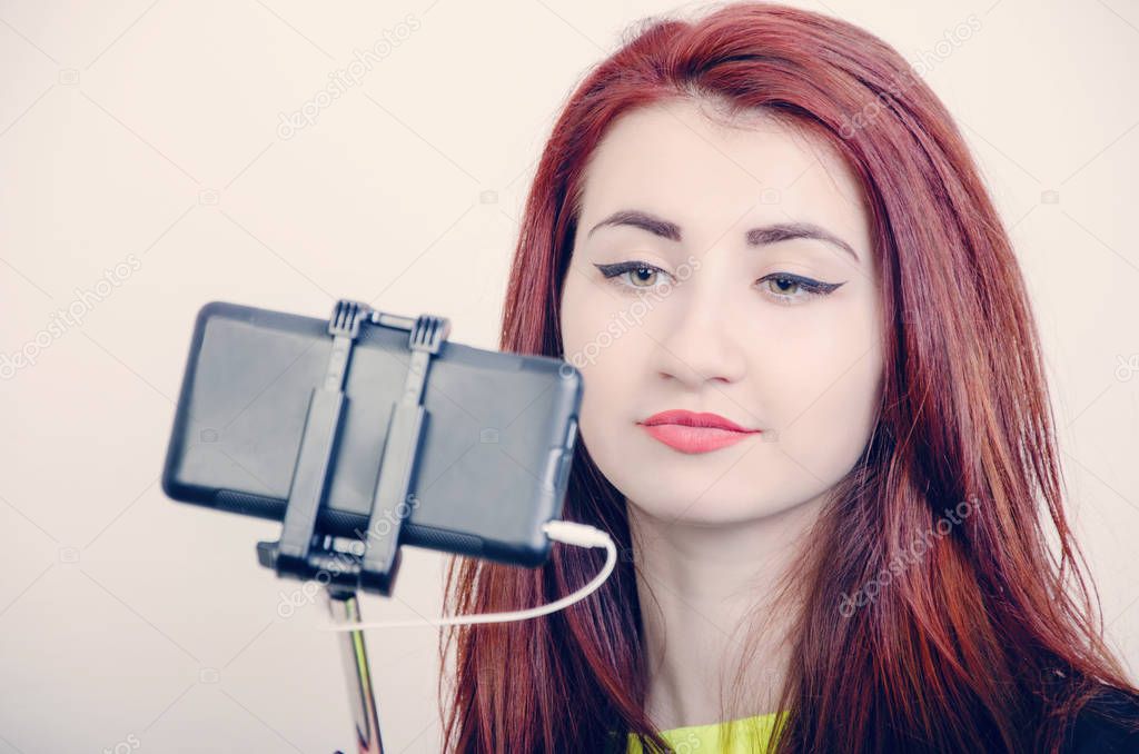 girl with a stick for a selfie