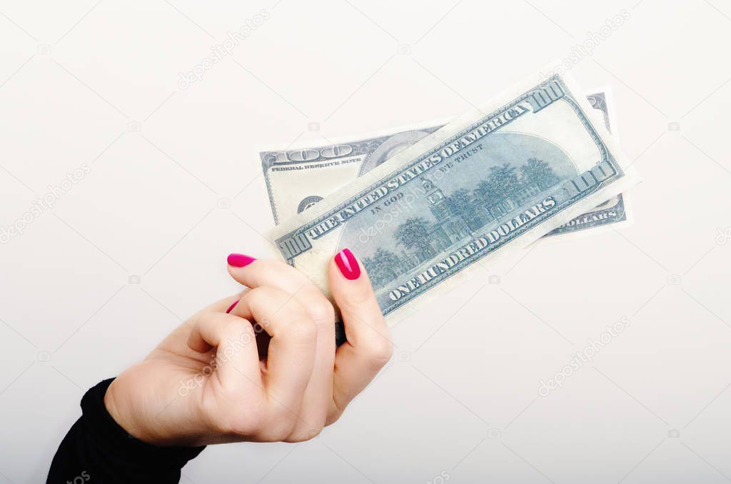 money is in a woman hand