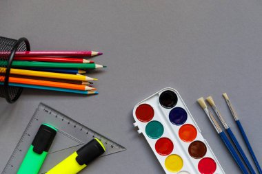 Stationery for students, students on a grey background. Ready for school