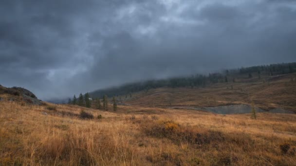 View on autumn valley with lake and stormy clouds in the sky timelapse, Siberia — Stock Video