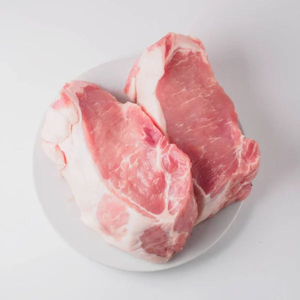 Carne de cerdo carbonatada en el plato — Foto de Stock