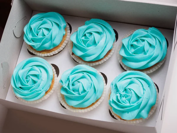 Cupcakes on paper box. white — Stock Photo, Image