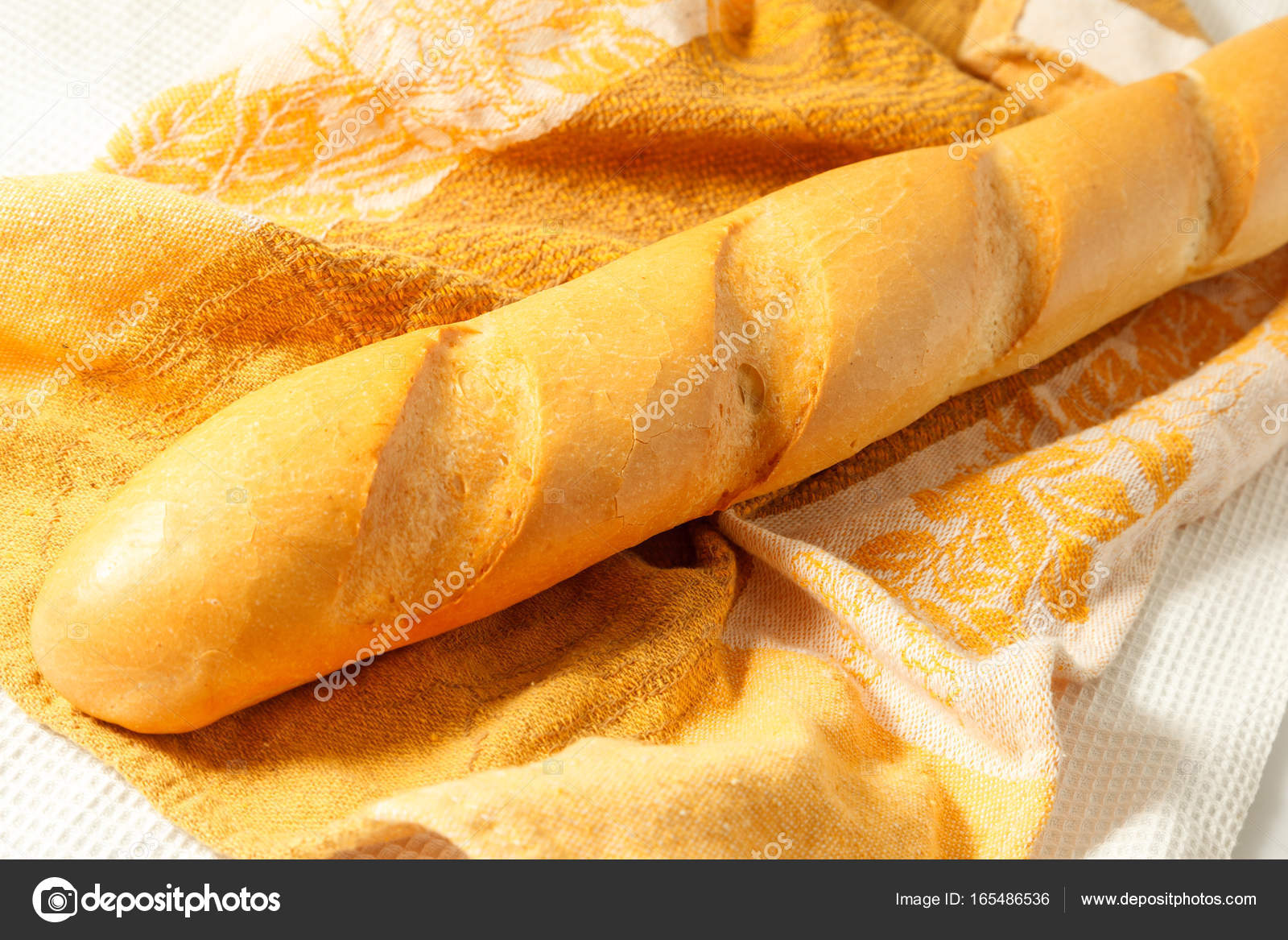 French White Long Baguette Bread On A Table Stock Photo